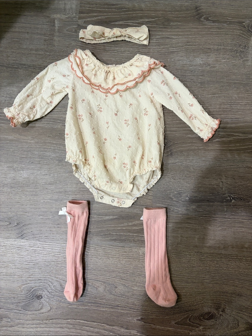 Chickpea Organic Cream Floral Ruffle One-Piece with Pink Socks and Headband